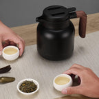 Desselan Insulated Vacuum Jug 1.2L | Stainless Steel Thermal Coffee Carafe Flask with Built-in Tea Filter, Push-Button Lid & Non-Slip Base (Black)